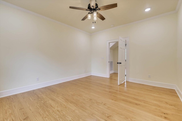 empty room with crown molding, ceiling fan, and light hardwood / wood-style flooring