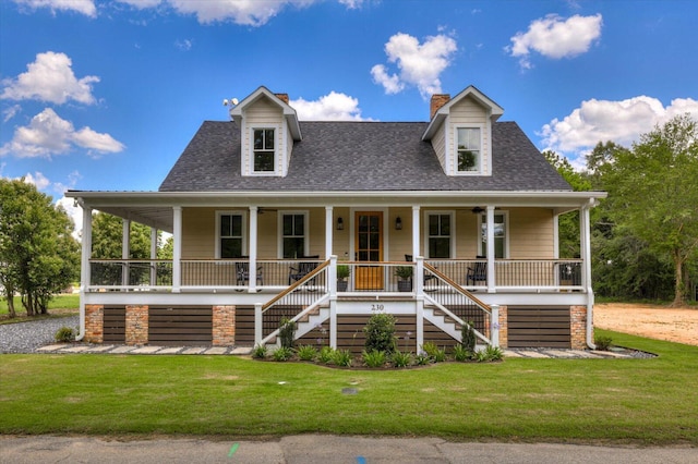 view of front of home with a front lawn and covered porch