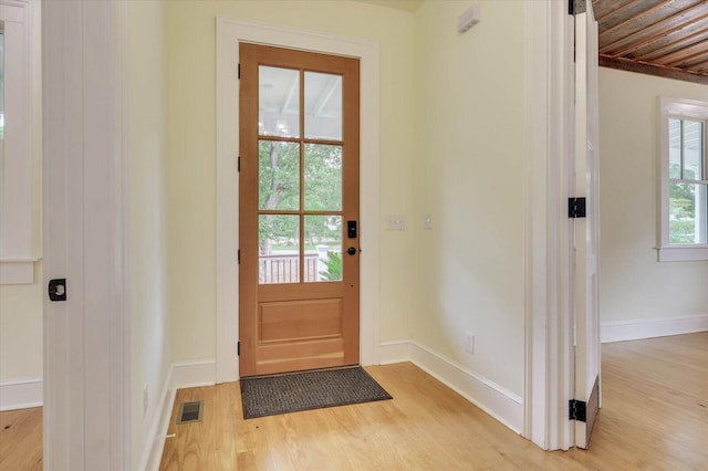 entryway with light hardwood / wood-style floors