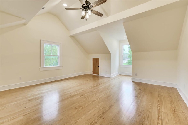 bonus room featuring ceiling fan, lofted ceiling, and light hardwood / wood-style floors