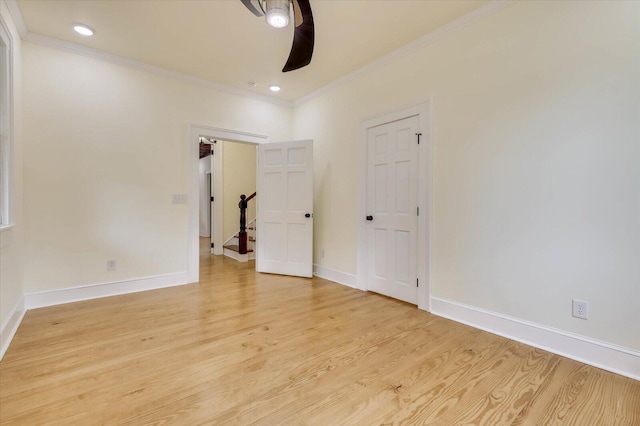 unfurnished bedroom with crown molding, ceiling fan, and light wood-type flooring