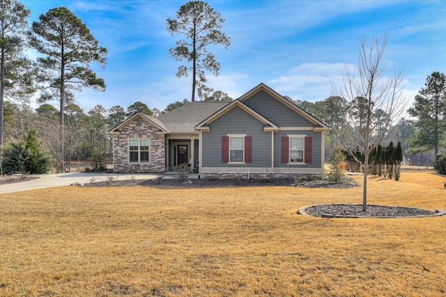 view of front of home with a front lawn