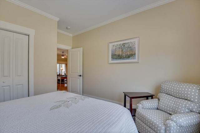 bedroom featuring ornamental molding and a closet