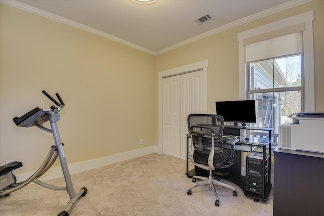 office space featuring light carpet and crown molding