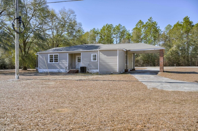 ranch-style home with a carport