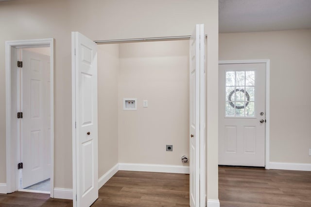 laundry area with washer hookup, dark hardwood / wood-style floors, and electric dryer hookup