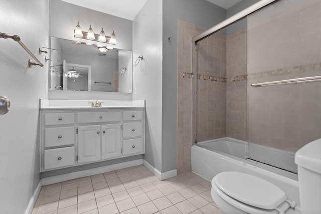 full bathroom with combined bath / shower with glass door, tile patterned floors, vanity, ceiling fan, and toilet