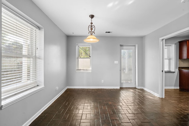 view of unfurnished dining area