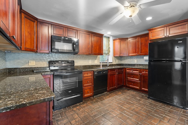 kitchen with dark stone counters, ceiling fan, sink, and black appliances