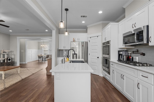 256 Dublin Loop, Grovetown, GA 30813 - kitchen with appliances with stainless steel finishes, a sink, ornamental molding, backsplash, and an island with sink