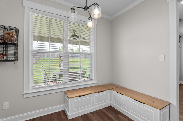 256 Dublin Loop, Grovetown, GA 30813 - unfurnished dining area featuring ornamental molding, dark wood-type flooring, baseboards, and a ceiling fan