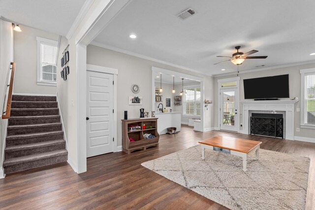 256 Dublin Loop, Grovetown, GA 30813 - living room with ornamental molding, dark wood-type flooring, stairway, healthy amount of natural light, and recessed lighting