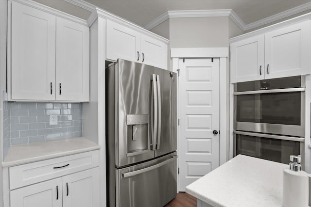 kitchen featuring white cabinetry and stainless steel appliances