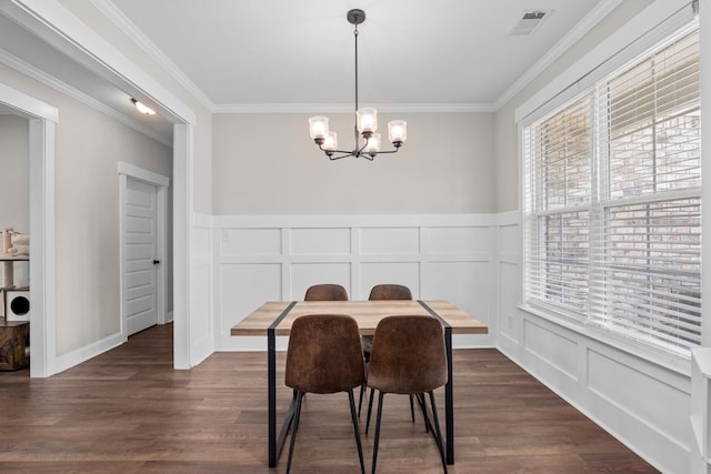 256 Dublin Loop, Grovetown, GA 30813 - dining area with a decorative wall, a chandelier, ornamental molding, dark wood-type flooring, and a wainscoted wall