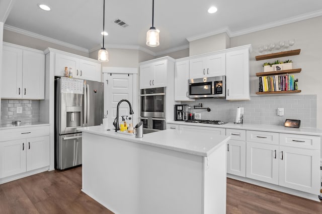 256 Dublin Loop, Grovetown, GA 30813 - kitchen featuring appliances with stainless steel finishes, tasteful backsplash, white cabinets, a sink, and light countertops