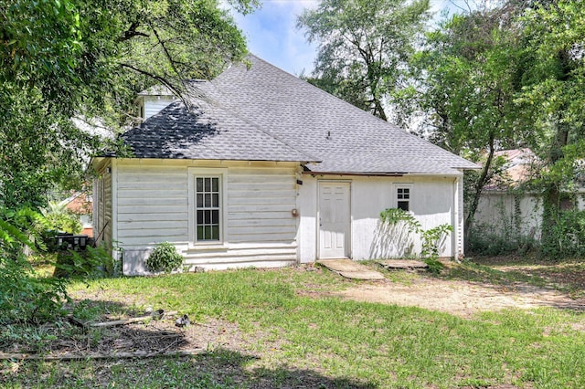 1107 Heard Ave, Augusta, GA 30904 - back of house with roof with shingles and a lawn