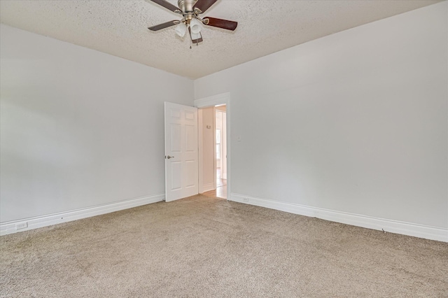 1107 Heard Ave, Augusta, GA 30904 - empty room with light carpet, a textured ceiling, and a ceiling fan