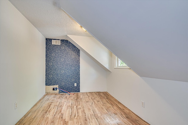 1107 Heard Ave, Augusta, GA 30904 - additional living space featuring wallpapered walls, wood finished floors, and a textured ceiling