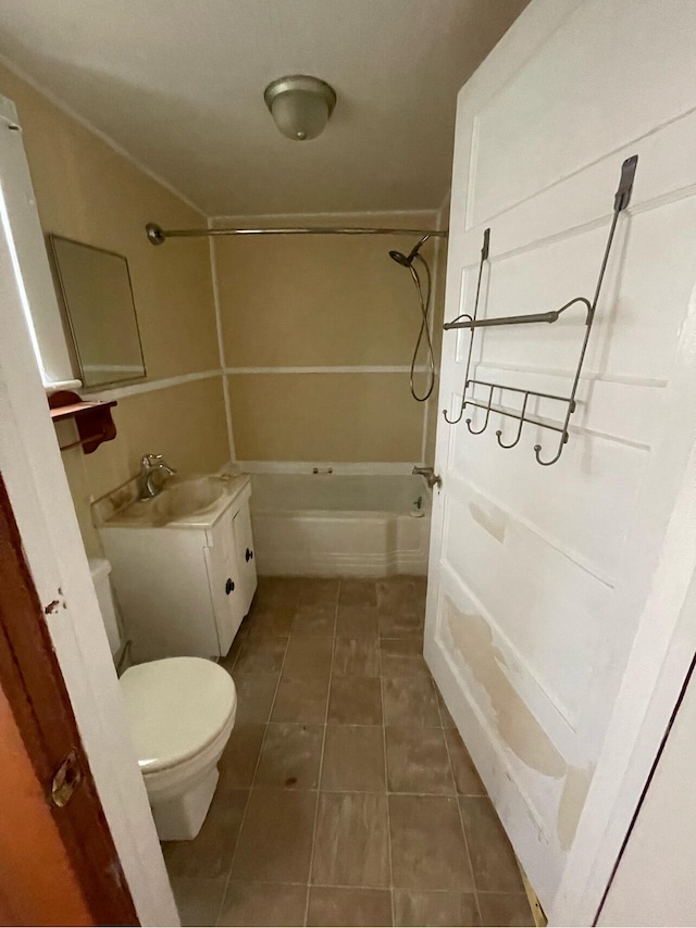 full bathroom featuring bathtub / shower combination, tile patterned floors, vanity, and toilet