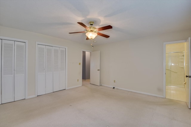 904 Big Hunt Rd, Augusta, GA 30907 - unfurnished bedroom with two closets, carpet, ensuite bathroom, and ceiling fan