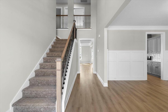 5511 Sweetwater Dr, Grovetown, GA 30813 - staircase with wood finished floors and ornamental molding