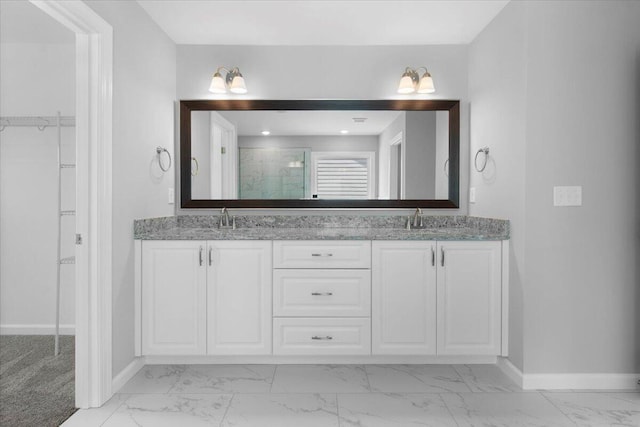 5511 Sweetwater Dr, Grovetown, GA 30813 - full bathroom featuring marble finish flooring, double vanity, a shower, and a walk in closet