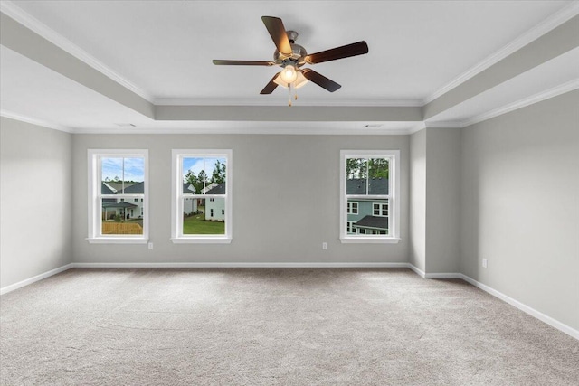 5511 Sweetwater Dr, Grovetown, GA 30813 - carpeted empty room featuring a raised ceiling, plenty of natural light, ornamental molding, and a ceiling fan