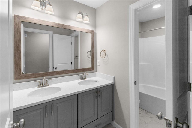 5511 Sweetwater Dr, Grovetown, GA 30813 - bathroom featuring marble finish floors, double vanity, and shower / bath combination