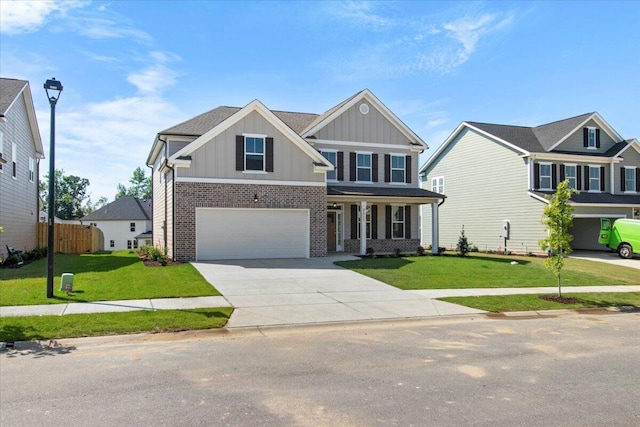 5511 Sweetwater Dr, Grovetown, GA 30813 - craftsman house with board and batten siding, brick siding, driveway, covered porch, and an attached garage