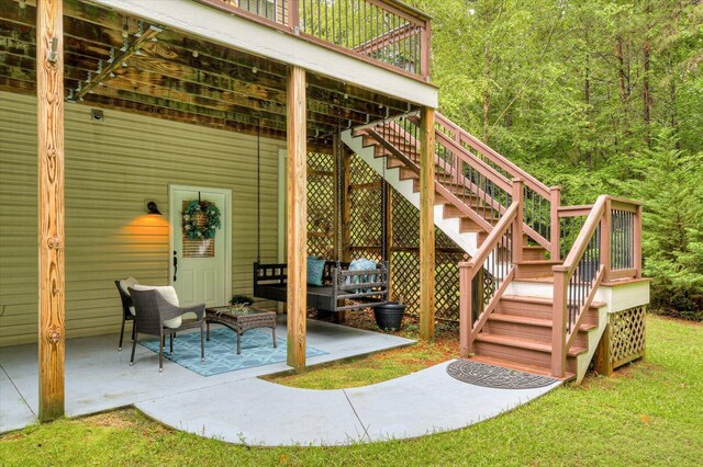 view of patio / terrace with outdoor lounge area and a deck