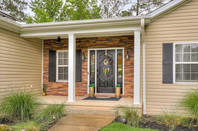 property entrance with a porch