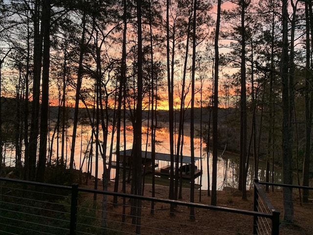 view of water feature with fence