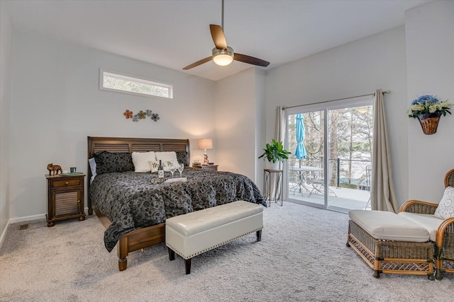 carpeted bedroom featuring ceiling fan, access to outside, multiple windows, and baseboards