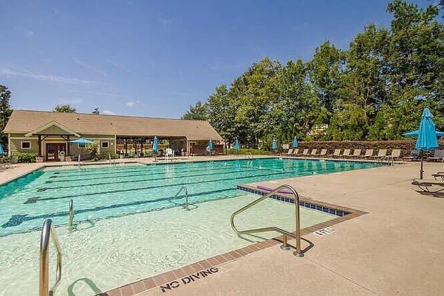 pool with a patio area