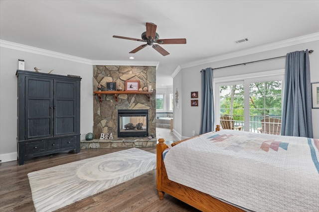 197 River Bend Dr, Clarks Hill, SC 29821 - bedroom featuring ornamental molding, wood finished floors, baseboards, a fireplace, and a ceiling fan
