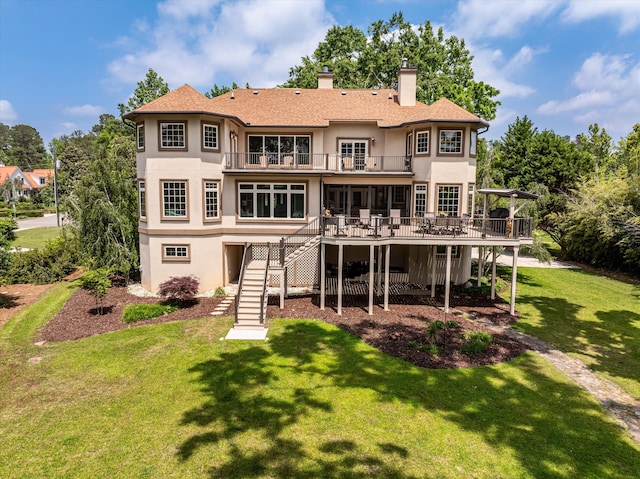 197 River Bend Dr, Clarks Hill, SC 29821 - rear view of house with stairs, stucco siding, a balcony, a wooden deck, and a chimney