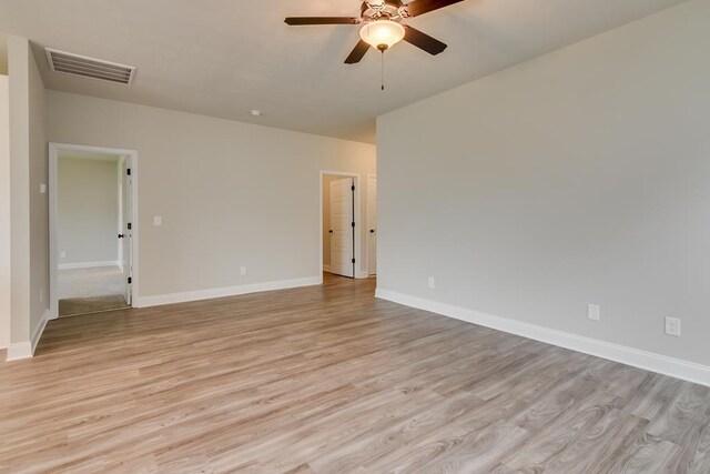 unfurnished room featuring ceiling fan and light hardwood / wood-style flooring