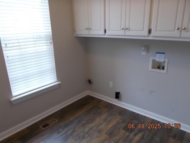 967 Windmill Pkwy, Evans, GA 30809 - laundry room featuring cabinet space, washer hookup, healthy amount of natural light, and dark wood-type flooring