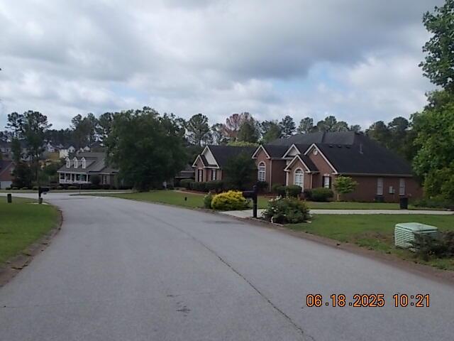 967 Windmill Pkwy, Evans, GA 30809 - view of asphalt road with a residential view