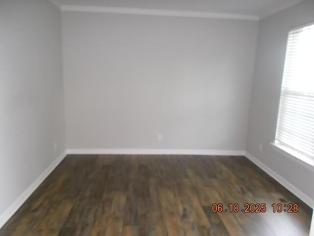967 Windmill Pkwy, Evans, GA 30809 - empty room with wood finished floors and crown molding