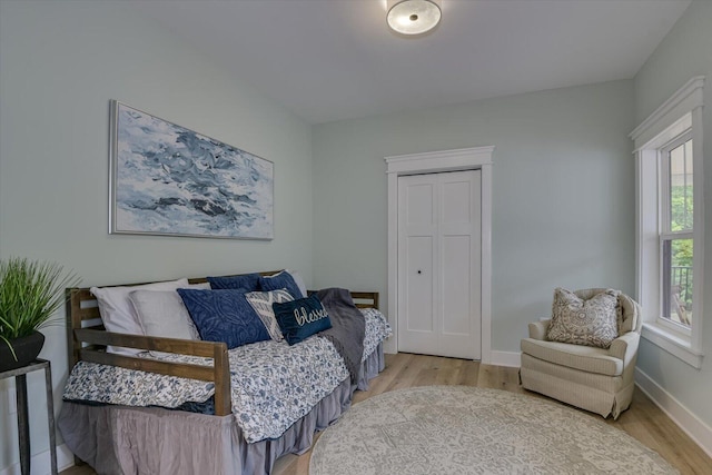 bedroom with light wood-type flooring