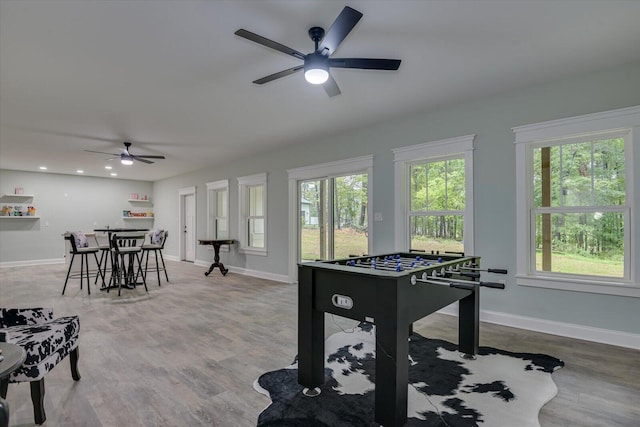 recreation room with ceiling fan