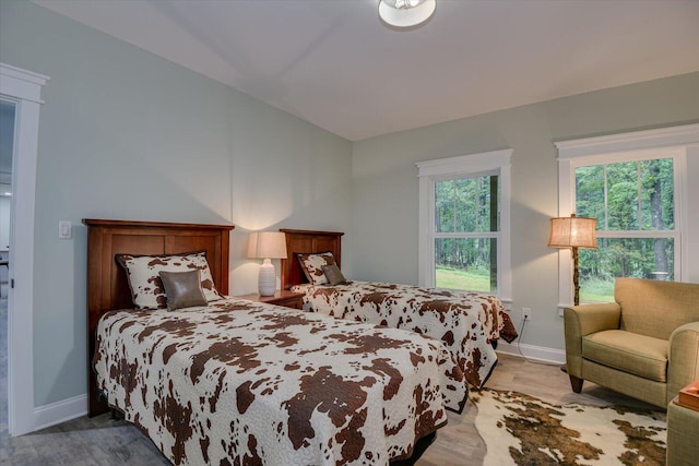 bedroom with light hardwood / wood-style flooring