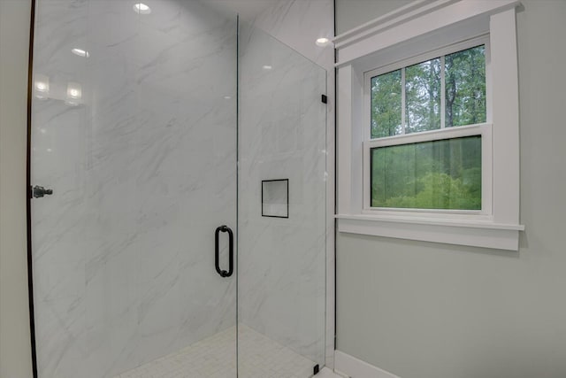 bathroom with an enclosed shower