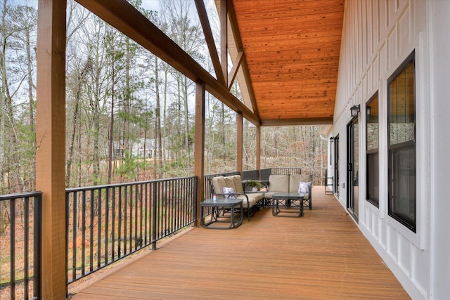 wooden deck featuring outdoor lounge area