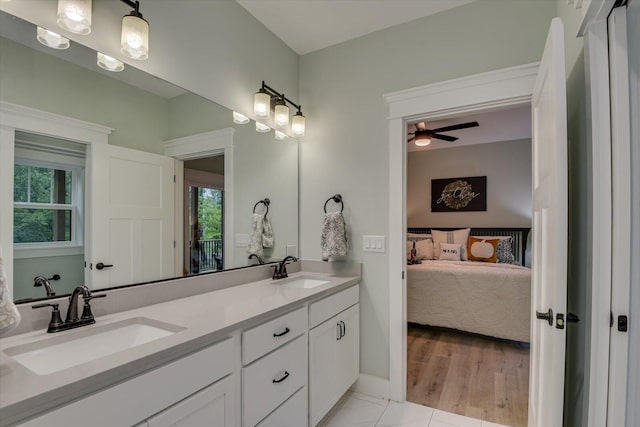 bathroom featuring vanity, tile patterned floors, and ceiling fan