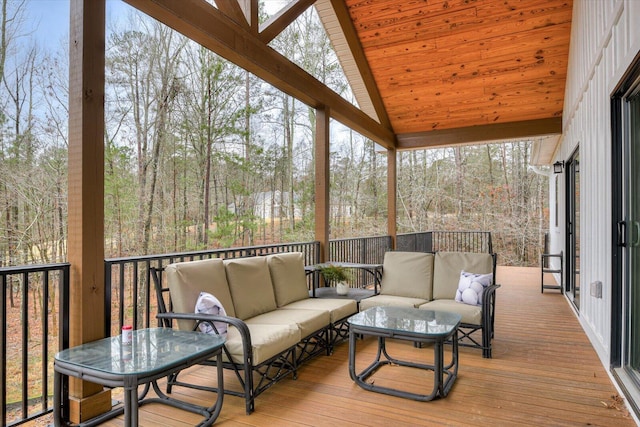 wooden deck with an outdoor hangout area