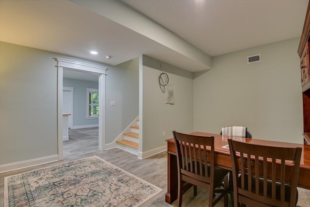 dining area with light wood-type flooring