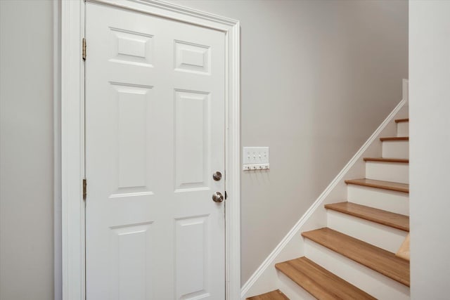 stairway with baseboards