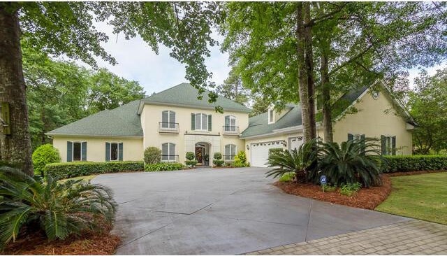 colonial home with a garage